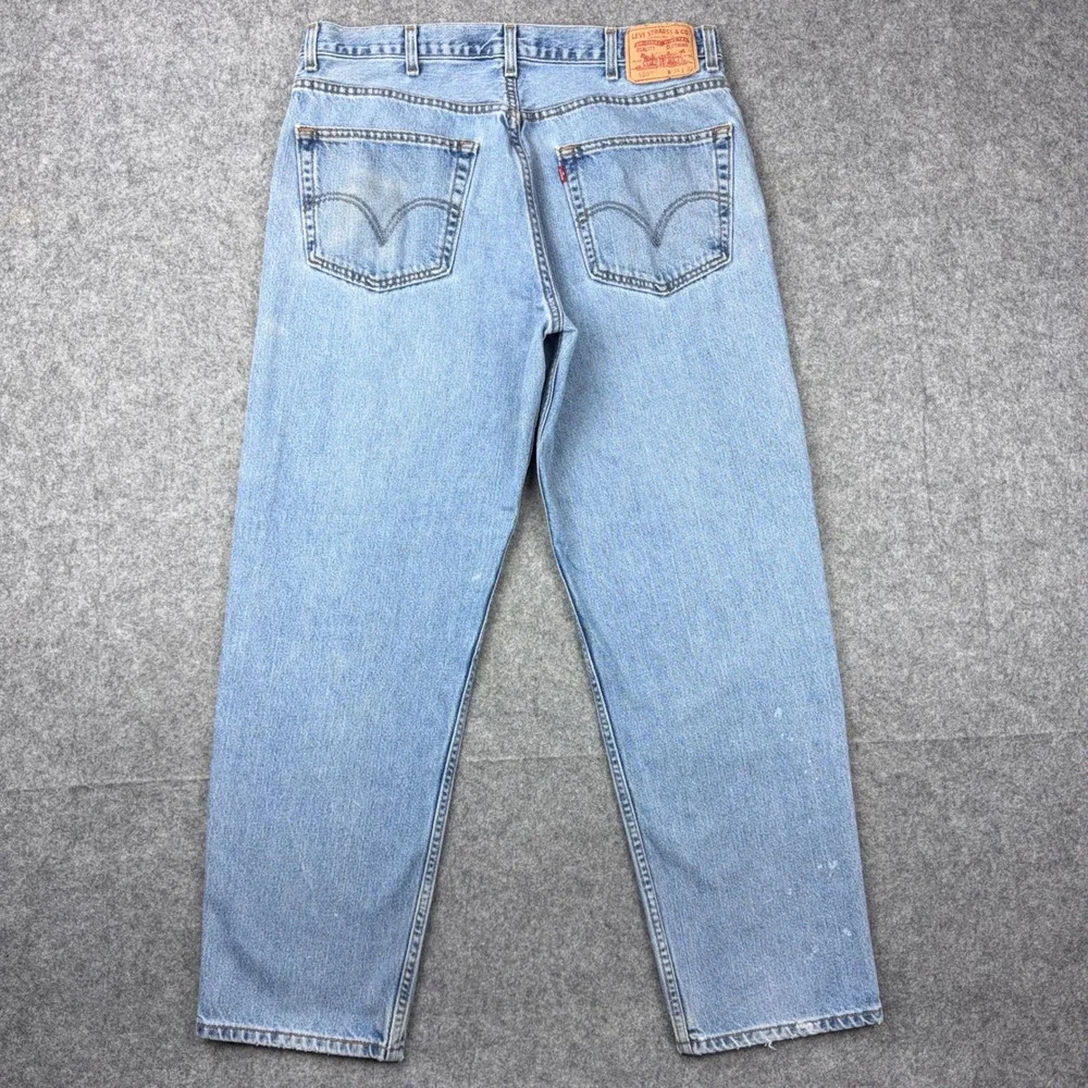 VTG Levi's Jeans Mens 38x32 Light Wash 550 Relaxed Tapered Leg Cotton 90s Y2K